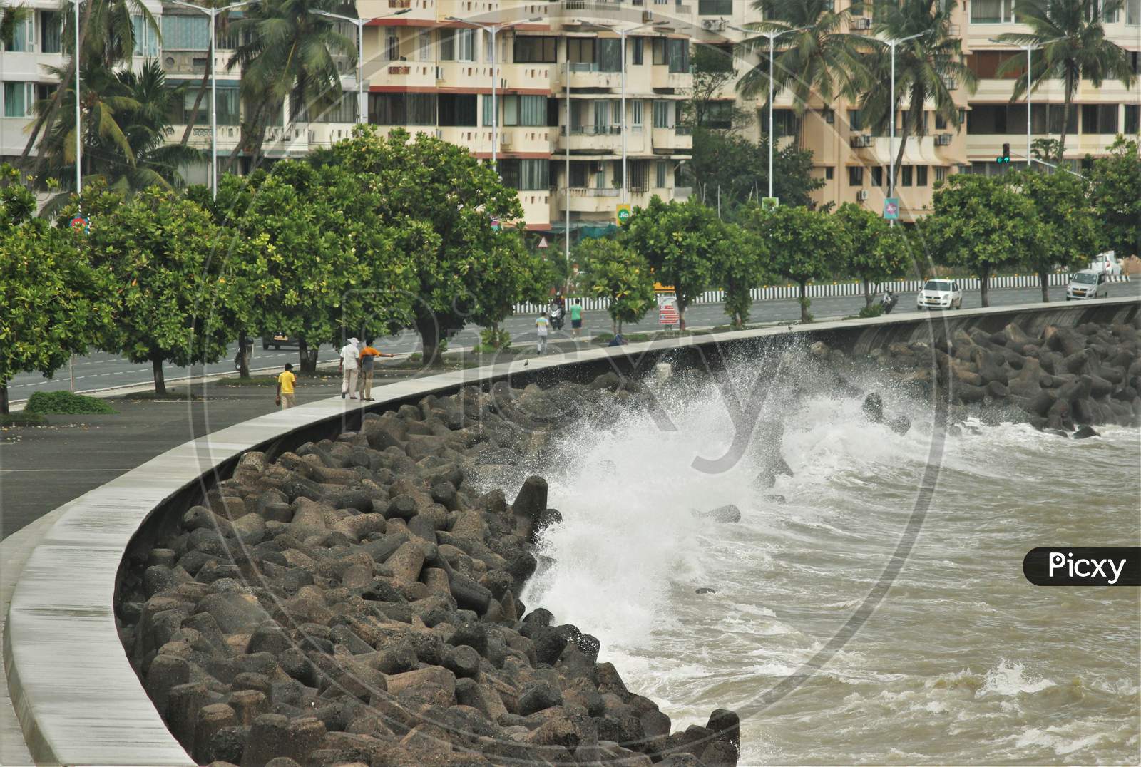 Sea waves strike at Marine Drive during rains, in Mumbai on June 18, 2020.