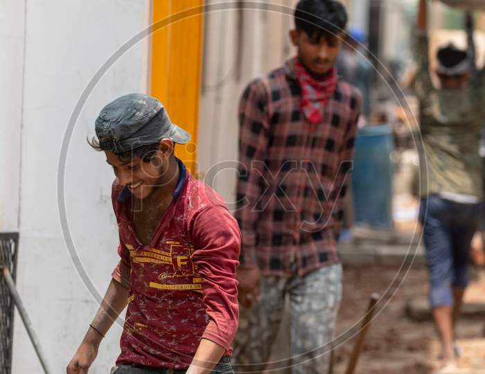 Indian labor with Medical Mask at Construction Site during Unlockdown India