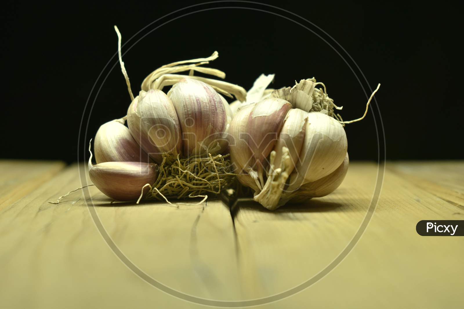 Garlic For Sale In A Market.