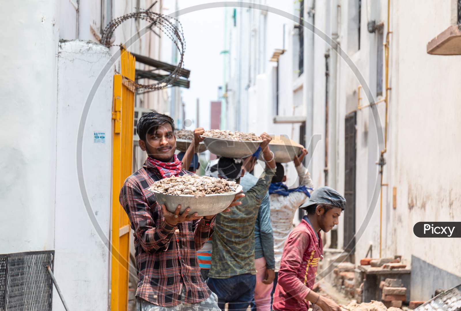 Indian labor with Medical Mask at Construction Site during Unlock down India