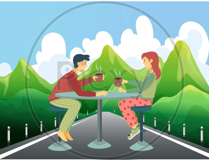 Couple Is Enjoying Coffee Sitting On The Road