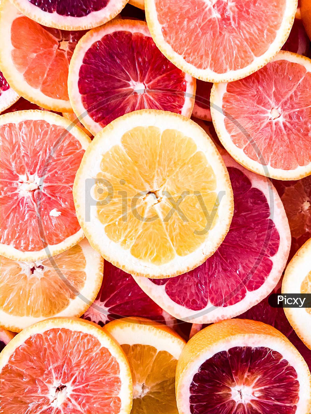 Fresh and organic grapefruit slices.Close-up. Studio photography.