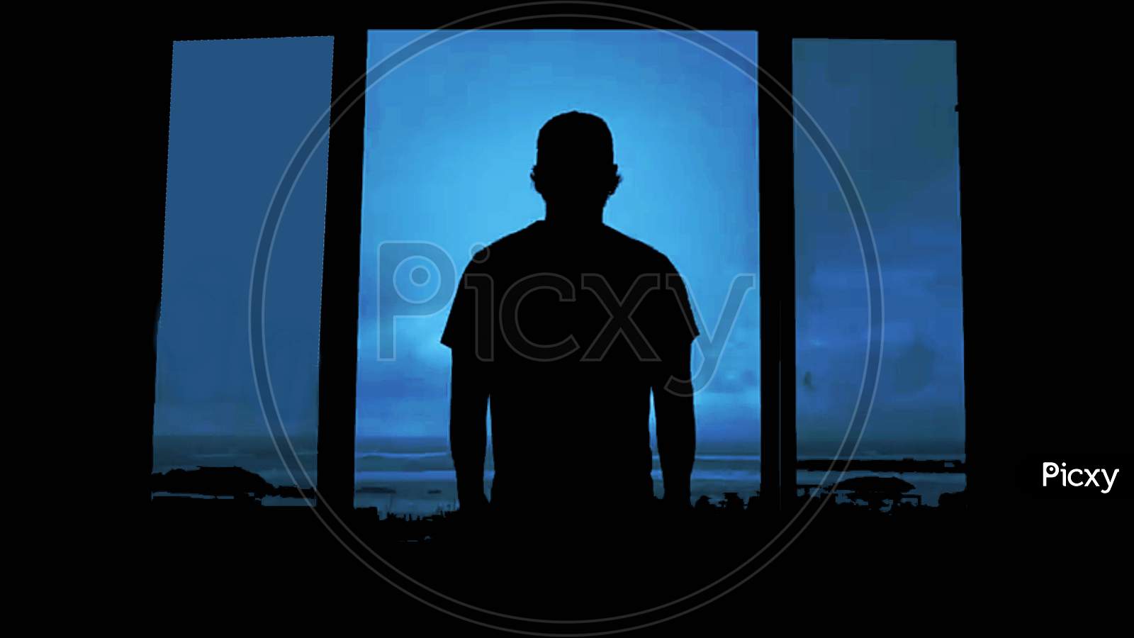 silhouette of a man in the window