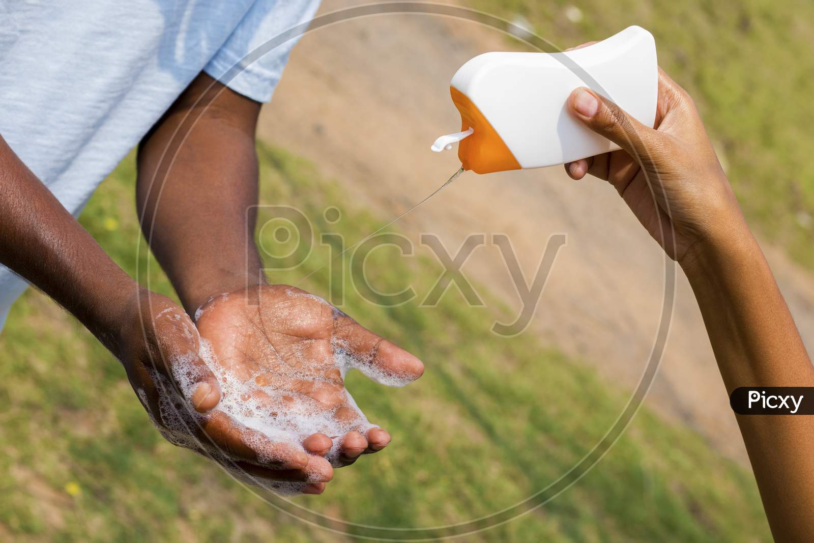 a man washing his hands by soap to maintain hygiene.stay healthy.avoid germ and virus.