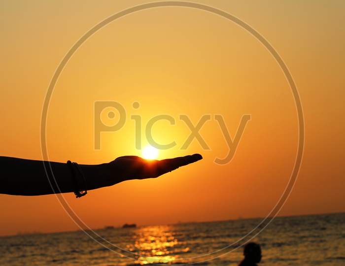 orange sunset view at Miramar beach goa