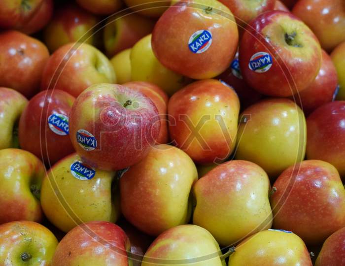 Dubai Uae - November 2019: Bunch Of Kanzi Apples On Boxes In Supermarket. Apple Put On Sale Shelves In The Supermarket. Fresh Ripe Apples Displayed Beautifully.