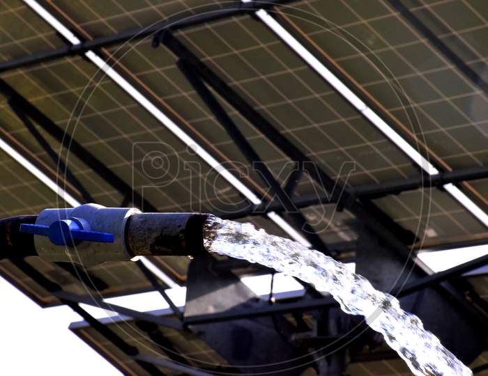 Agricultural Equipment For Field Irrigation, Water Jet, Behind Which Is Solar Panel'S,