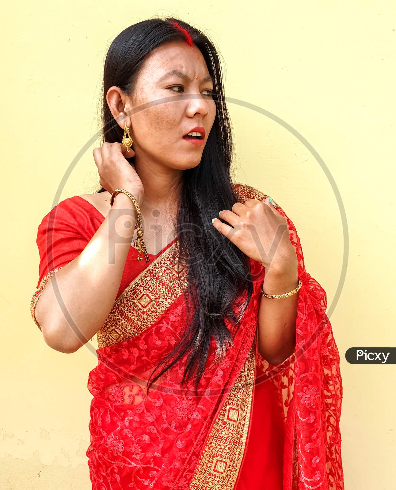 Photo of beautiful girl posing with wearing saree