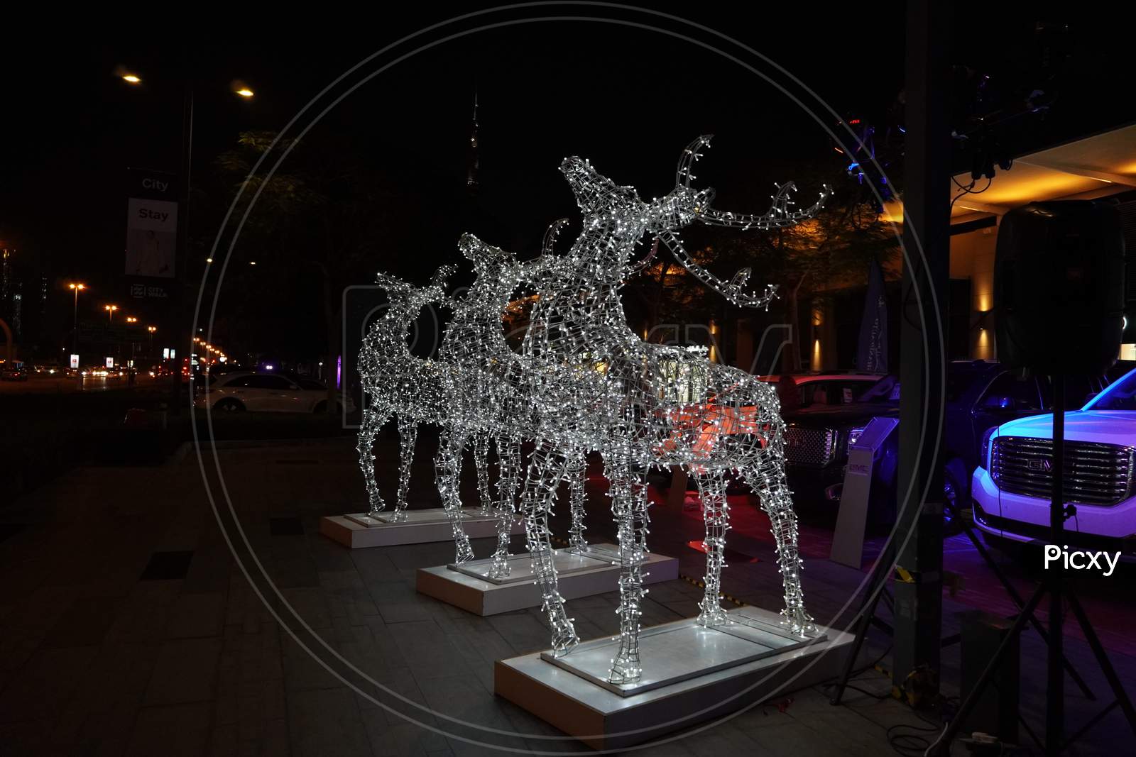 Glowing Reindeer Made Of Wire And Light Bulbs. Christmas Decorations. Christmas Lights On Reindeer Shape Wire Frame Mesh. Deer Christmas Outdoor Decoration. Decorative Lights- Dubai Uae December 2019