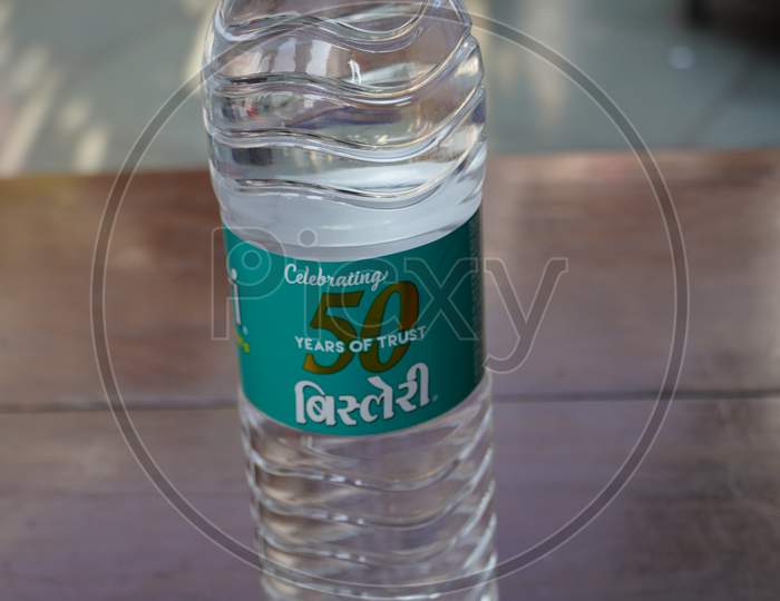 Mineral Water Of Bisleri In A Single Use Disposable Plastic Bottle Is Placed On Dining Table. : Udaipur India - March 2020