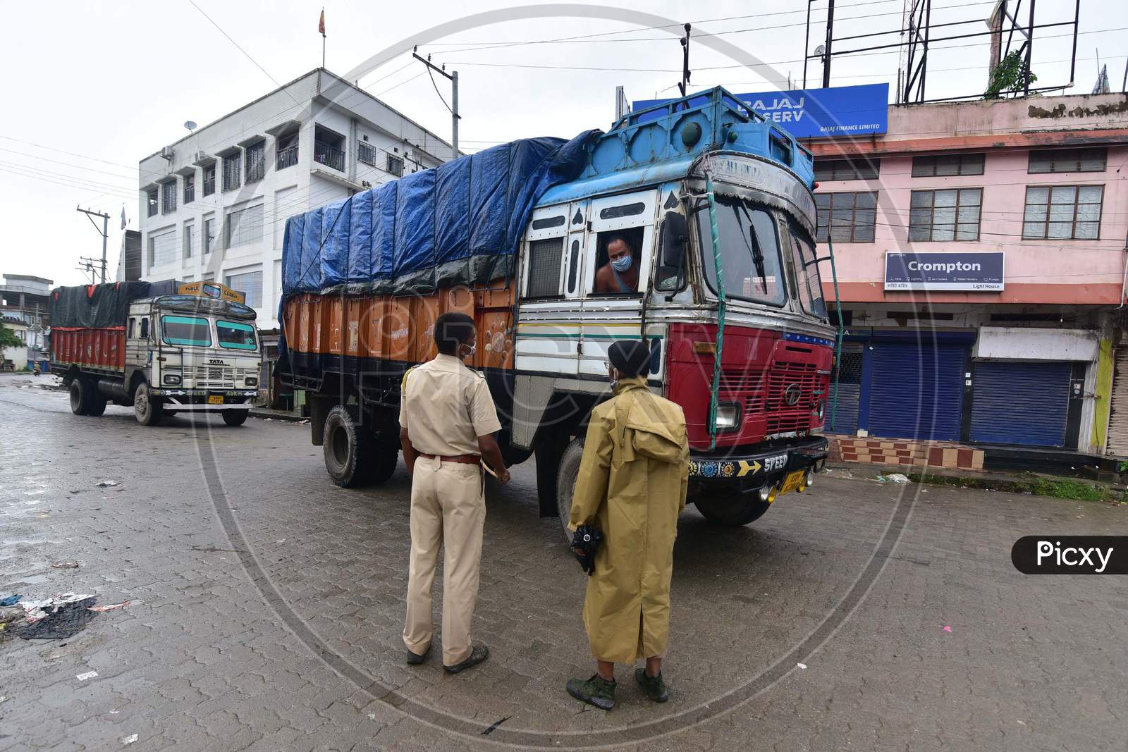 Police Questions Commuters Who Defied Curfew During  Lockdown, In The Wake Of Coronavirus Pandemic, In Nagaon District Of Assam On June 27,2020. Authority Announced The Imposition Of A Weekend Lockdown In All Urban Areas Of The State.
