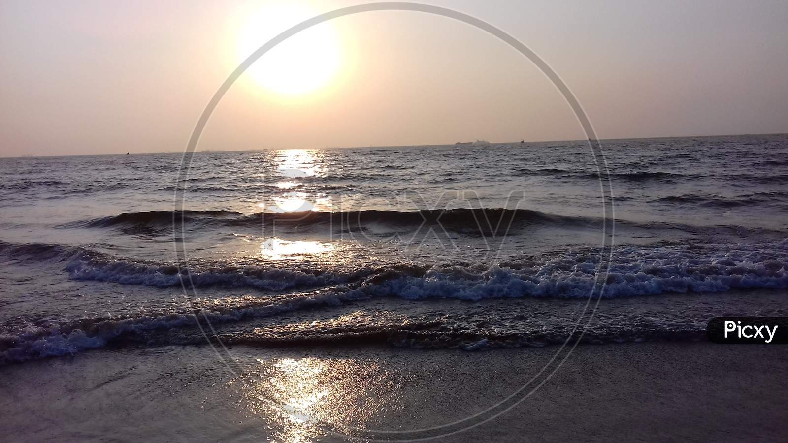 view of sunset at Miramar beach, Goa