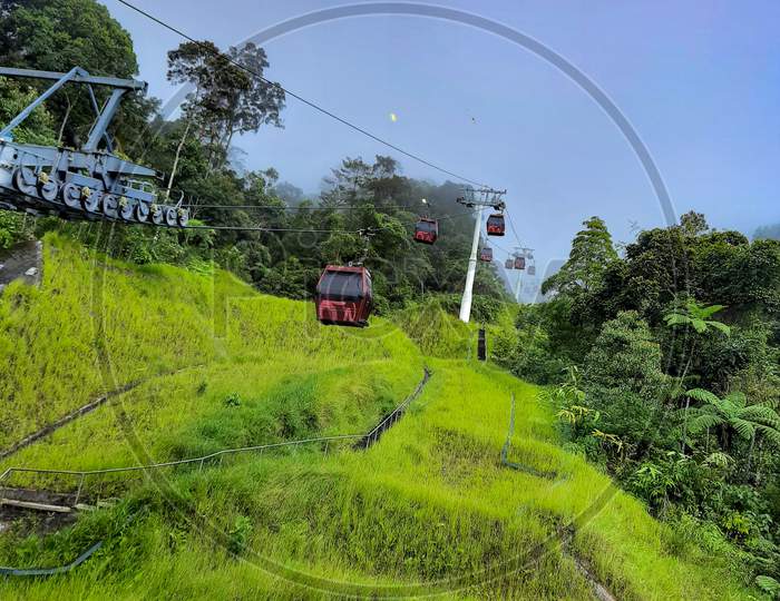 In a ropeway cable car going up from kualampur to genting highlands, Sky view and chin swee caves temple on skyway cable car, genting, malaysia, Skyway Cable Car