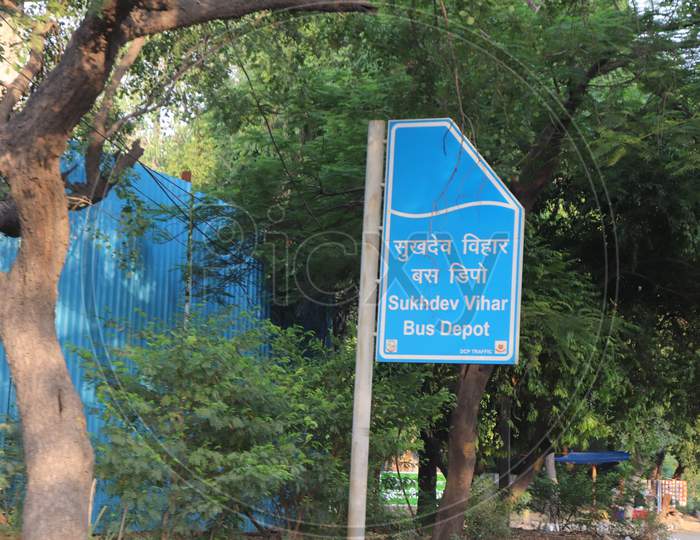 "New Delhi /India -21.06.2020: Street Board  For  Sukhdev  Vihar Bus Depot texture In English and Hindi Language "