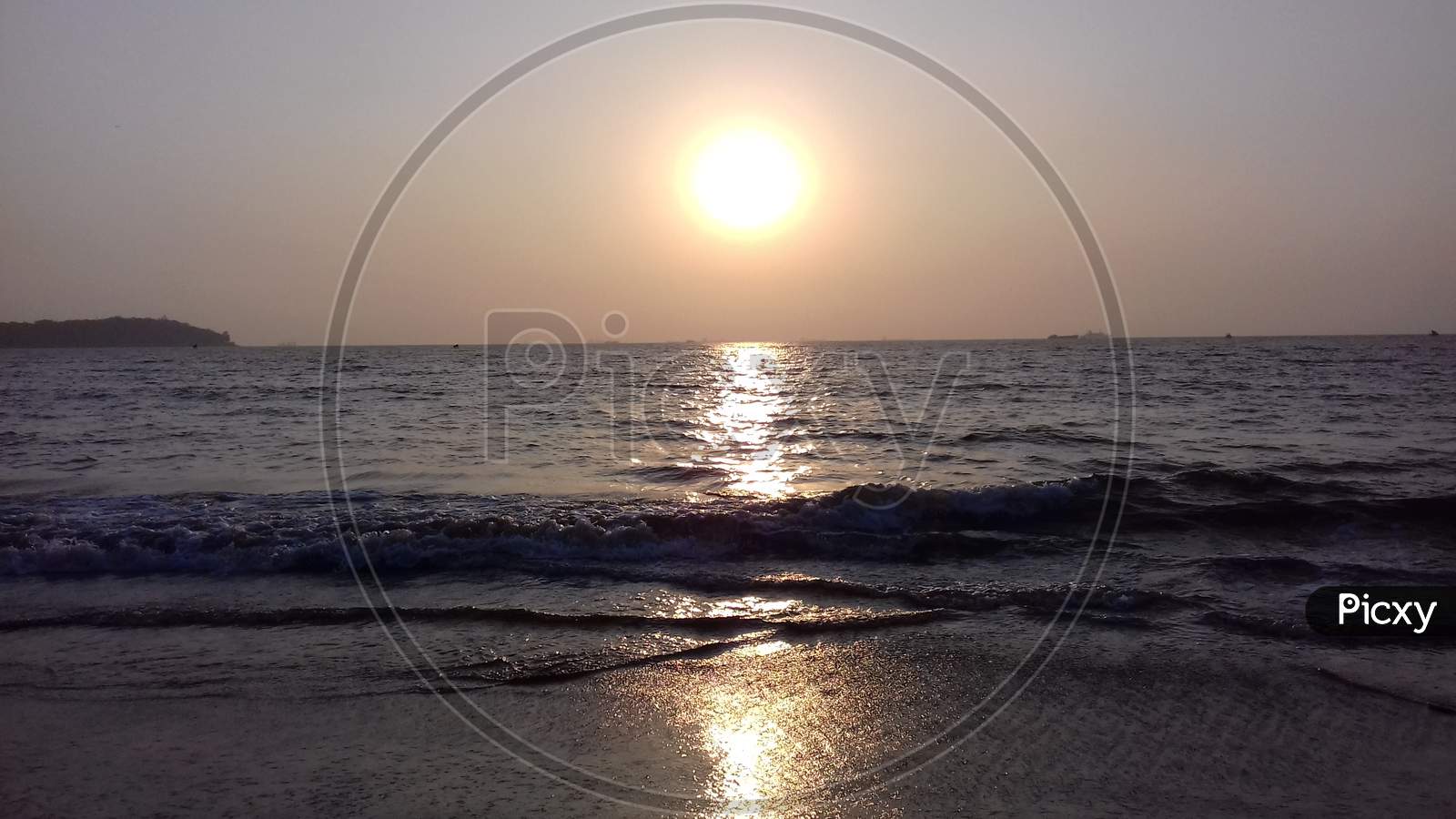 view of sunset at Miramar beach, Goa