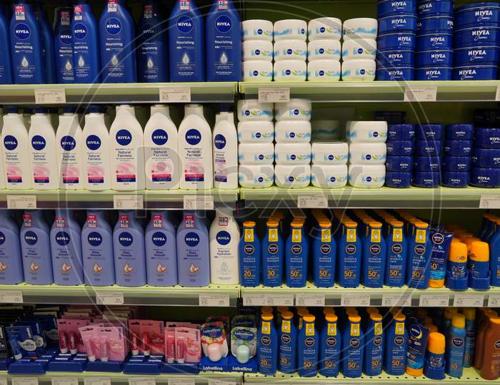 Nivea Serum, Fairness Lotion, Lip Gloss, Sun Block, Sunscreen, Sun Spray. Bottles And Jars. Nivea Skincare And Cosmetic Products For Sell On Supermarket Shelf. - Dubai Uae December 2019