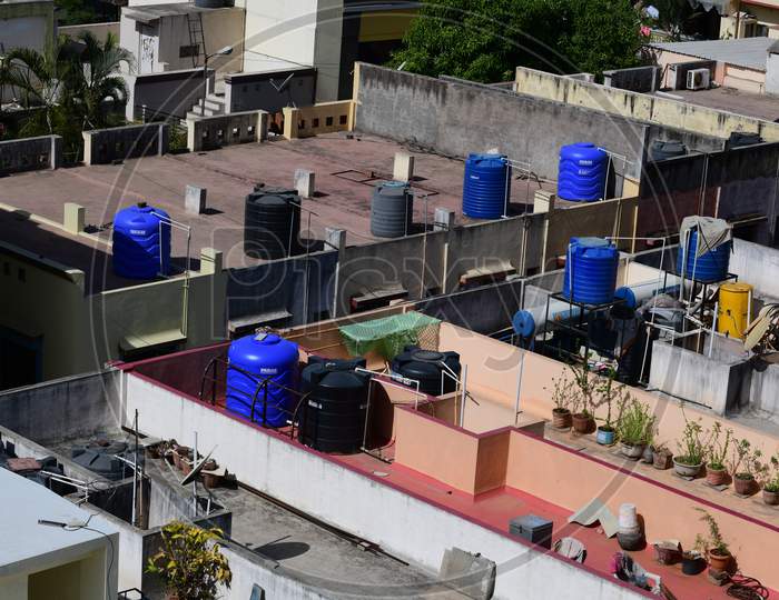 PVC water storage tanks installed on row house terraces