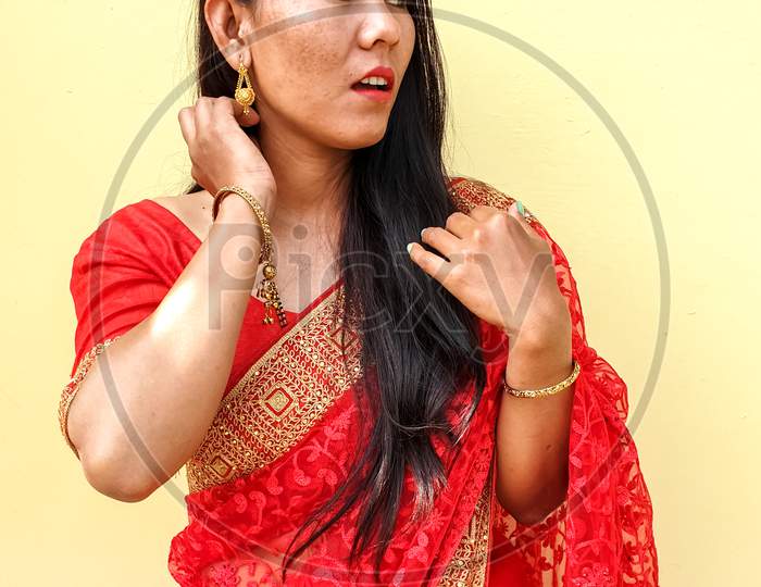 Photo of beautiful girl posing with wearing saree