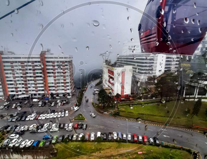View of cable car to Genting highland with the water dropped on the glass in Kuala Lumpur Malaysia