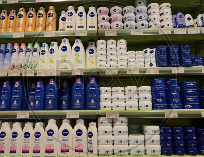 Nivea Serum, Fairness Lotion, Lip Gloss, Sun Block, Sunscreen, Sun Spray. Bottles And Jars. Nivea Skincare And Cosmetic Products For Sell On Supermarket Shelf. - Dubai Uae December 2019
