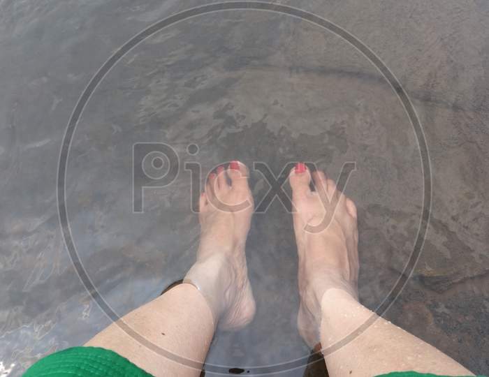 foot immersed in water
