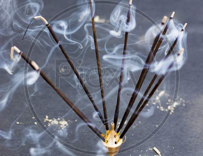 Incense Bamboo Stick with smoke,religious purpose.