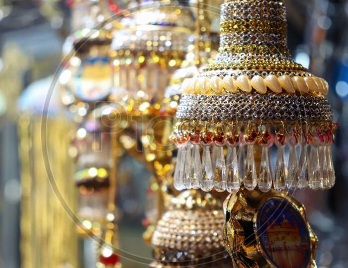 Large Earrings Held At A Shop For Selling