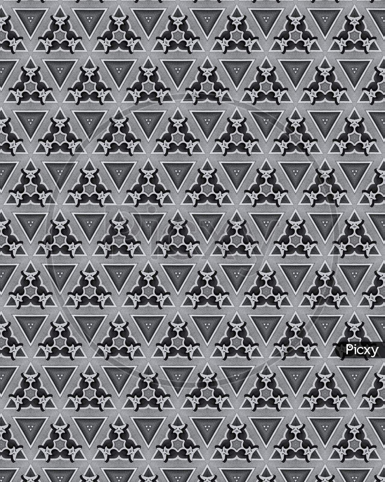 Elegant And Ornamental Dark Grey Symmetrical Designs On Solid Sheet Of Wallpaper. Concept Of Home Decor And Interior Designing