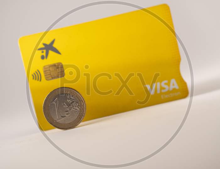debit card and coin