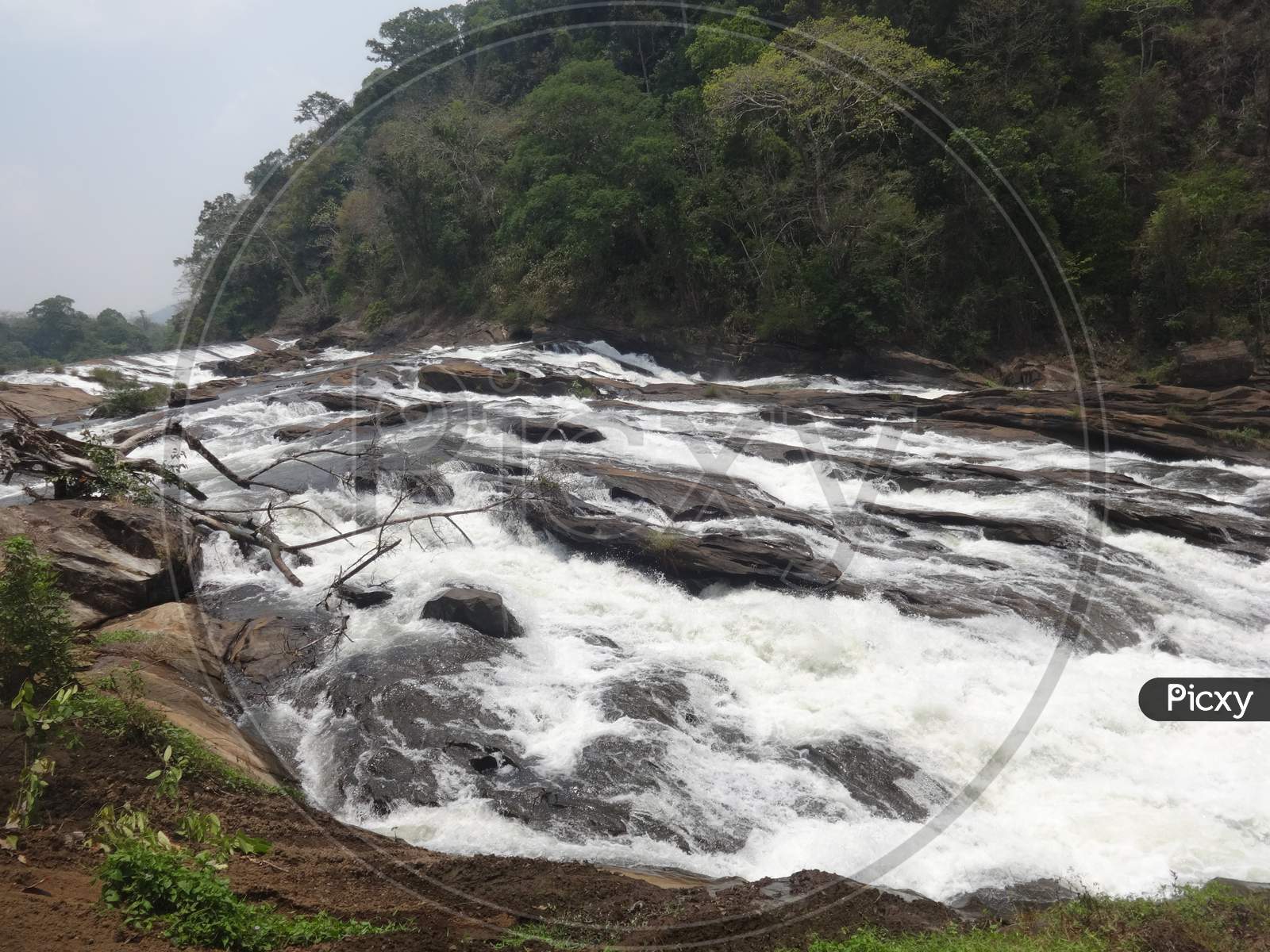 a view of Vazhachal falls in Kerala