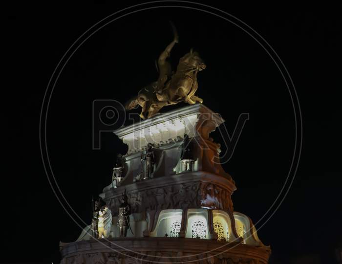 Statue Lighted During Night And Winter