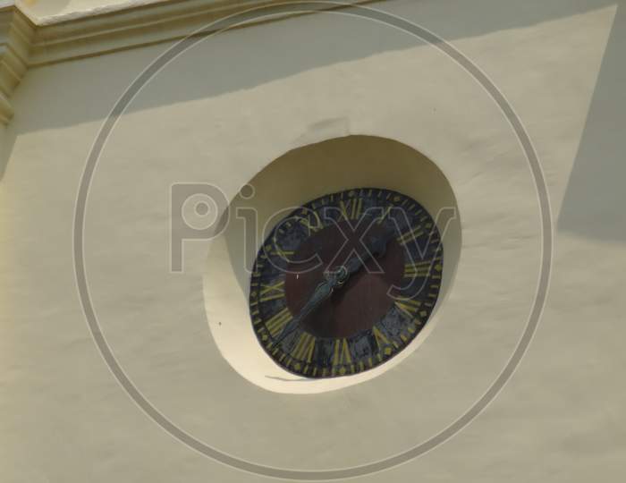 an ancient clock outside St Francis Church, Kochi