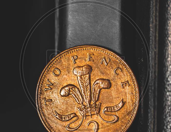 British Coin 2 Pence (2001) Isolated On Vintage Black Background With Space For Copy Text. Front Side Of Two Pence Coin. England Coins Collectors World Wide.