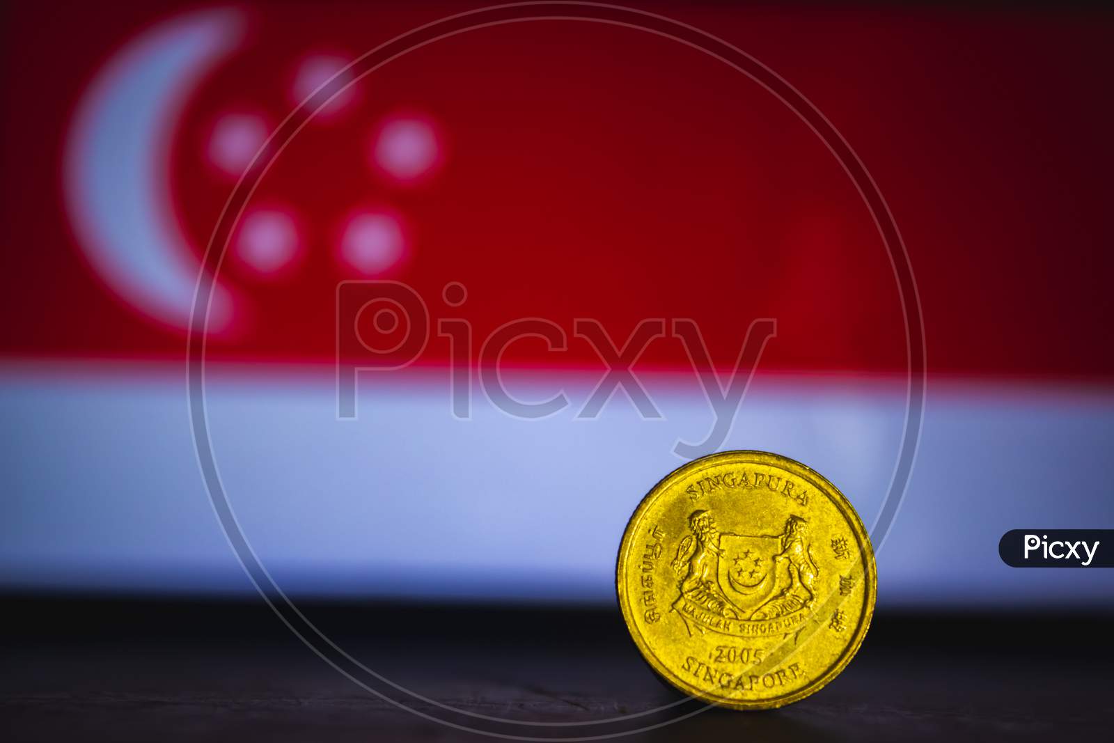 Singapore Currency - Five Cent Coin Of Singapore Isolated On Singapore Flag Background. Singapore Dollar 5 Cent Coin With Space For Text Copy