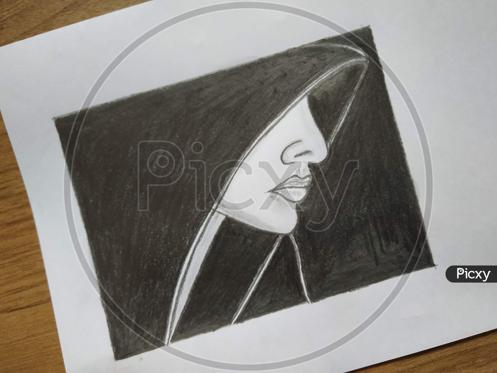A girl under black hoodie pencil sketch