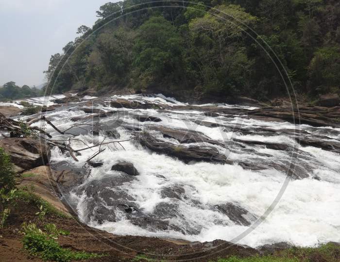 a view of Vazhachal falls in Kerala