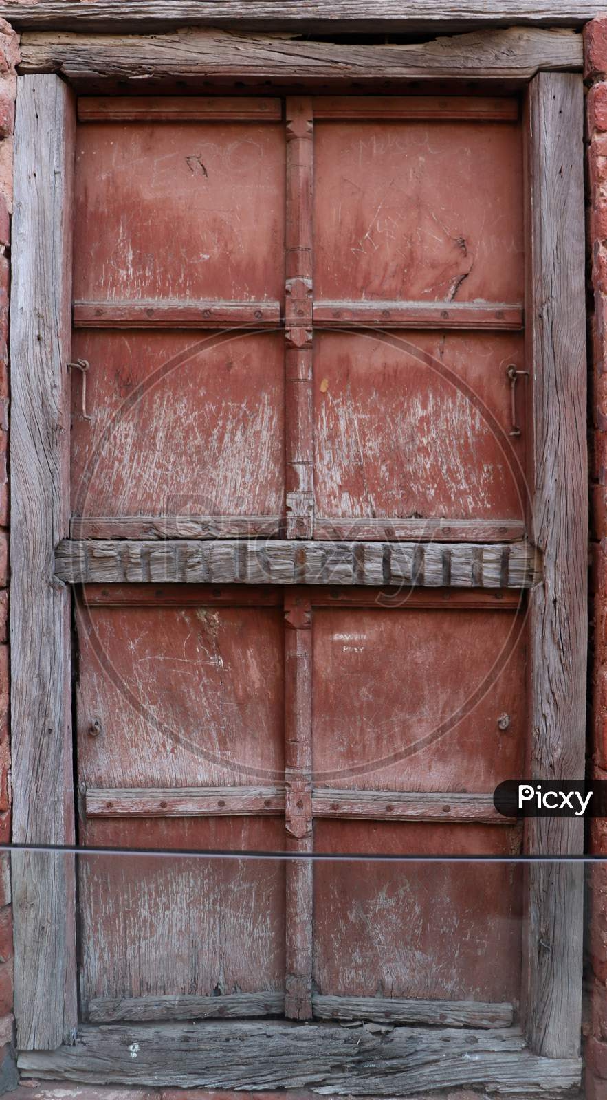 Brownish Red Wooden Door