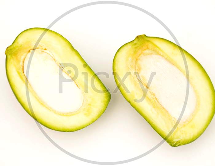 cutt the ripe mango isolated on white background.