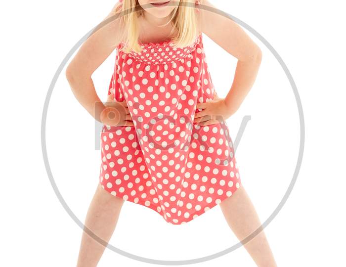 Full Length Shot Of Young Blonde Girl Wearing Pink Floppy Hat, A Polka Dot Dress And Flip Flops. Isolated On White Studio Background