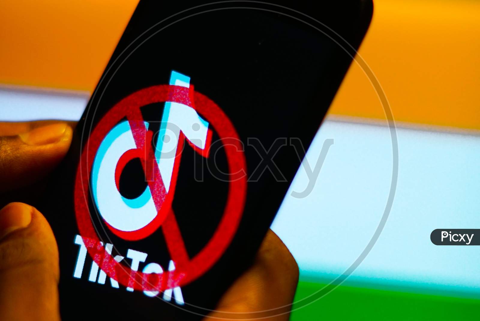 Banned Tiktok Application Logo On A Mobile Screen with Indian Flag in the background