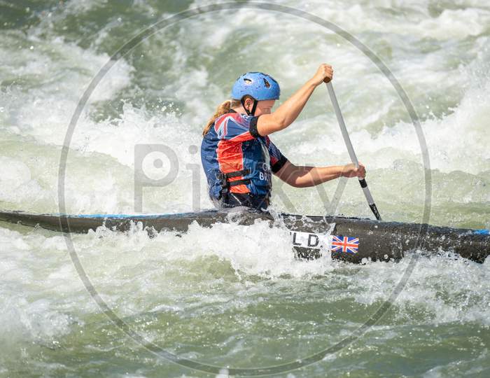 Great Britain Canoe Slalom Athlete Paddles Across White Water