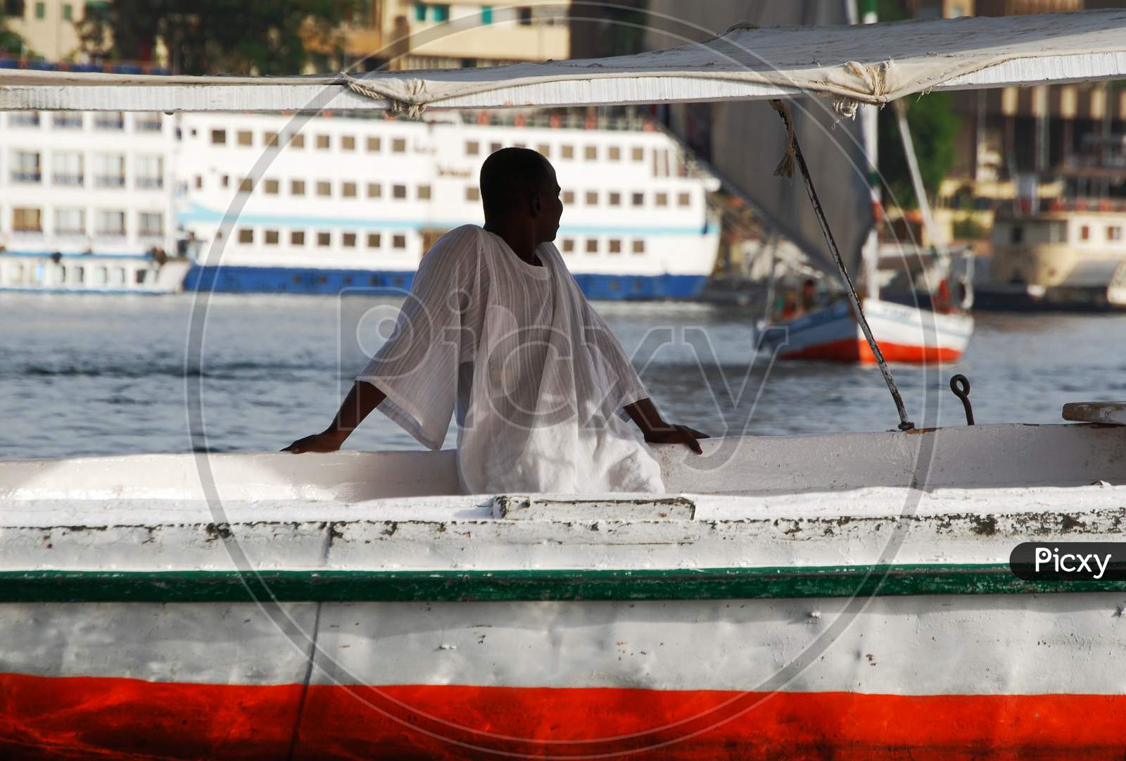 Nubian sailor sailing on the Nile river.