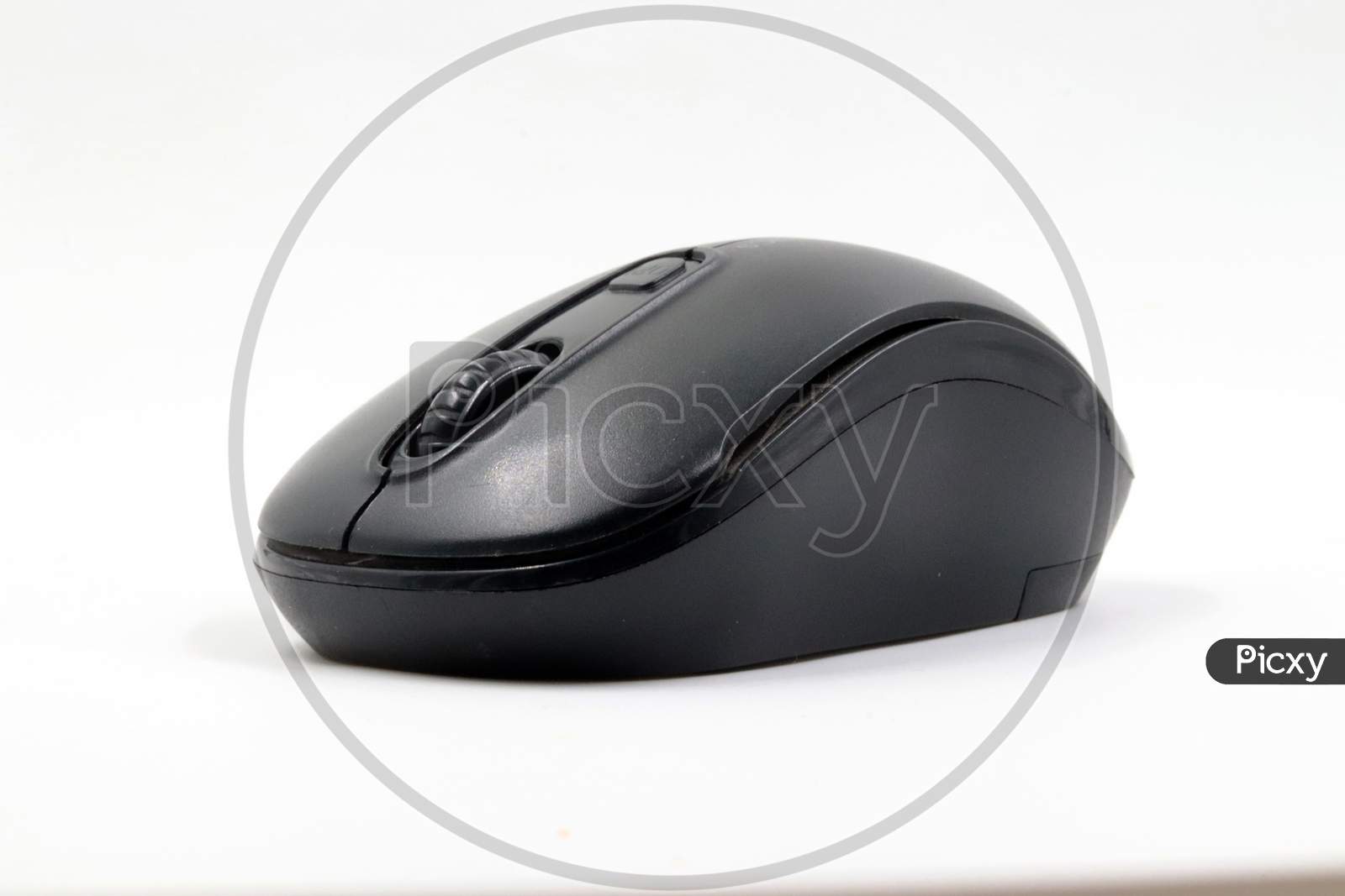 side view of wireless mouse with white background