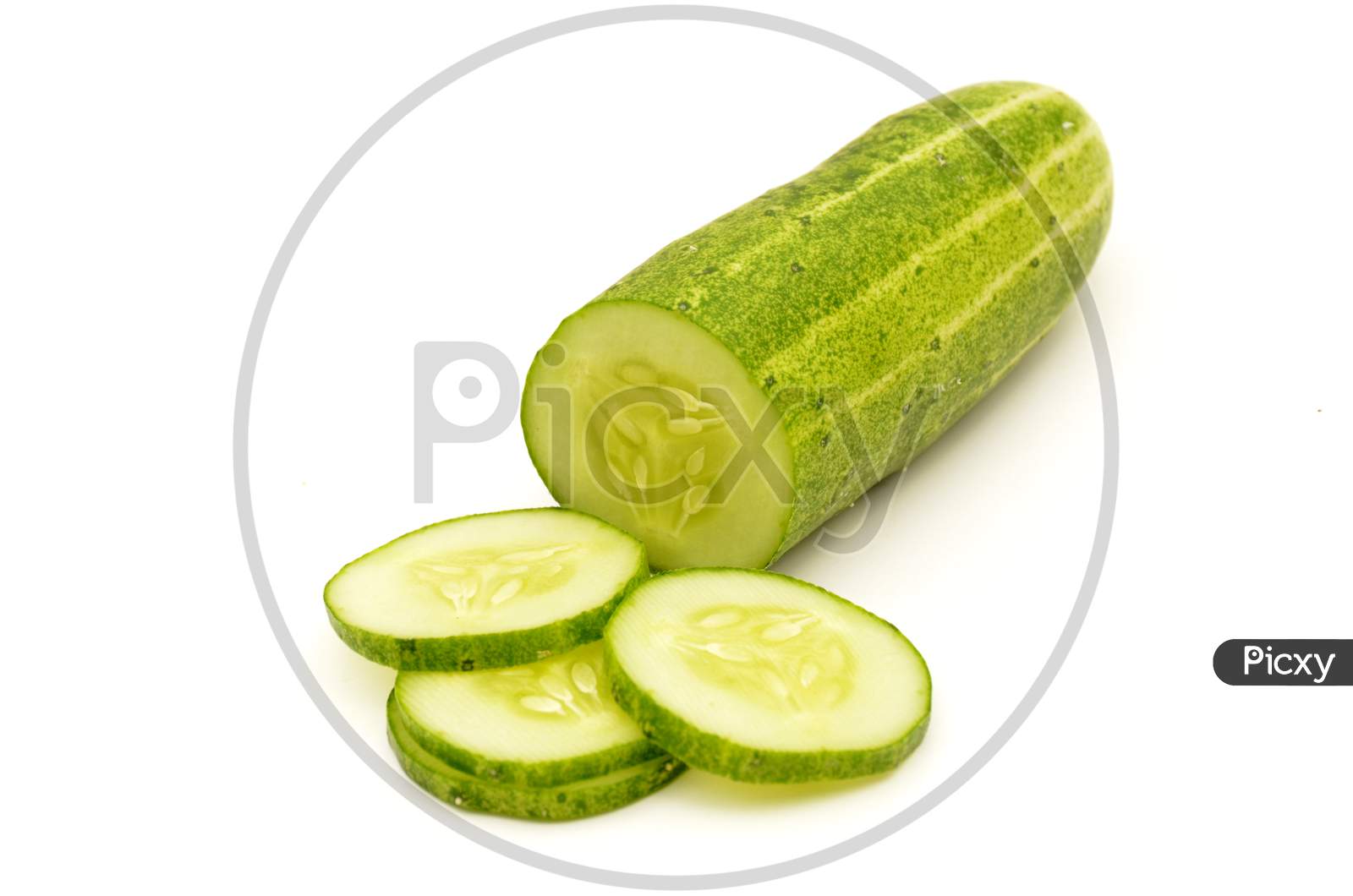 ripe cucumber with slice isolated on white background