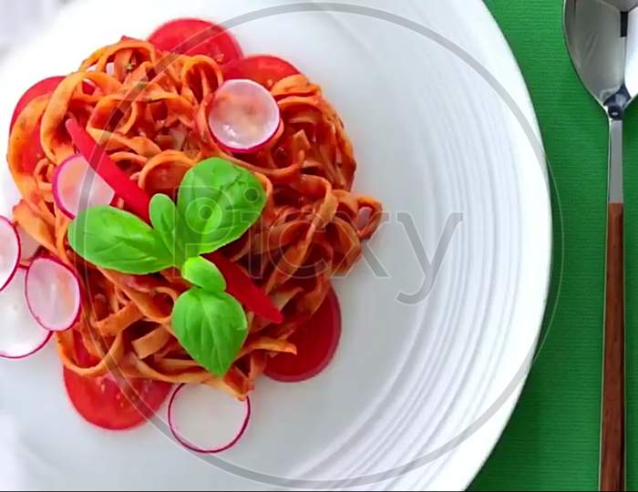 Tomato Salad In dish With spoon
