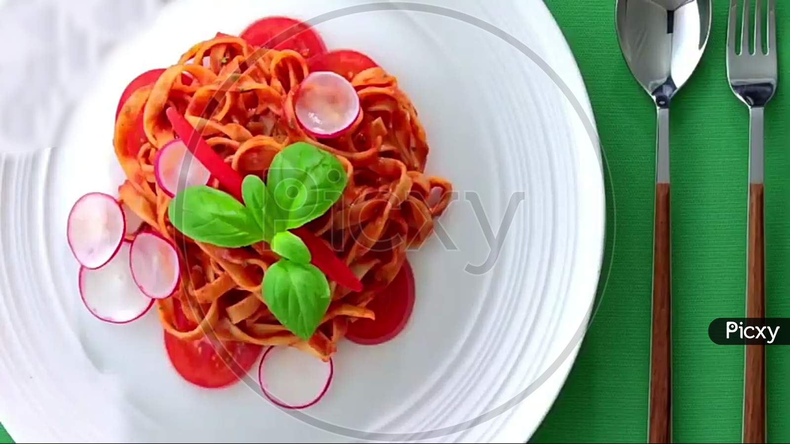 Tomato Salad In dish With spoon