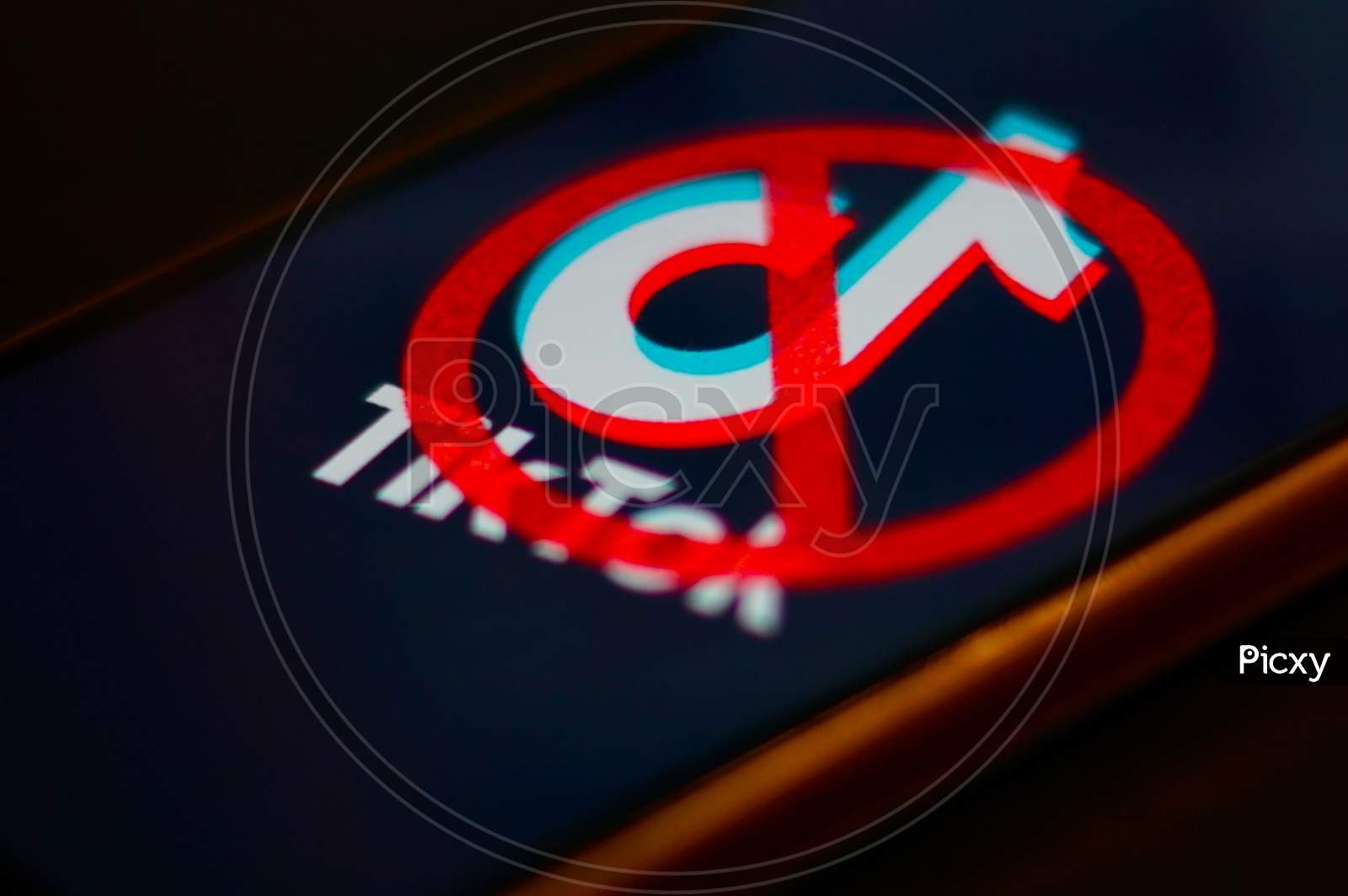 Tiktok Application Logo with banned symbol on a Mobile Screen