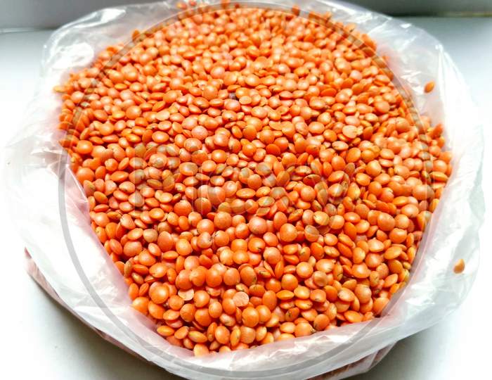 Red Lentils Or Masoor Dal Isolated On White Background