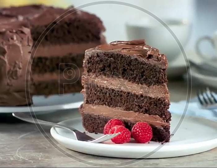 piece of chocolate cake with raspberries