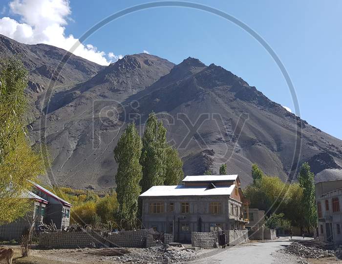 House Of A Kargil Resident In Jammu Kashmir And Ladakh Union Territory Hills Road Trees Are Also In Frame July 2019